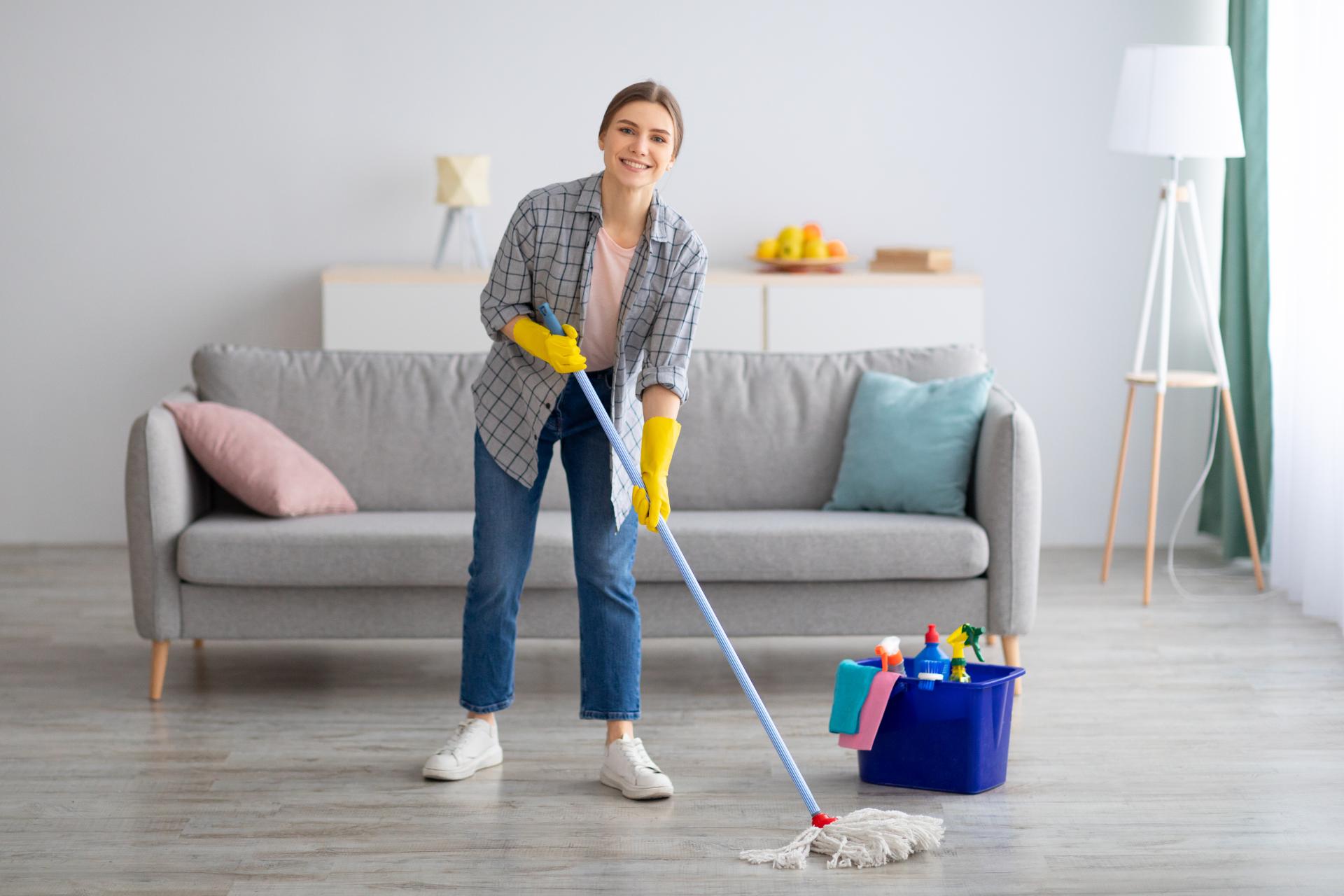 Woman mopping floor indoors