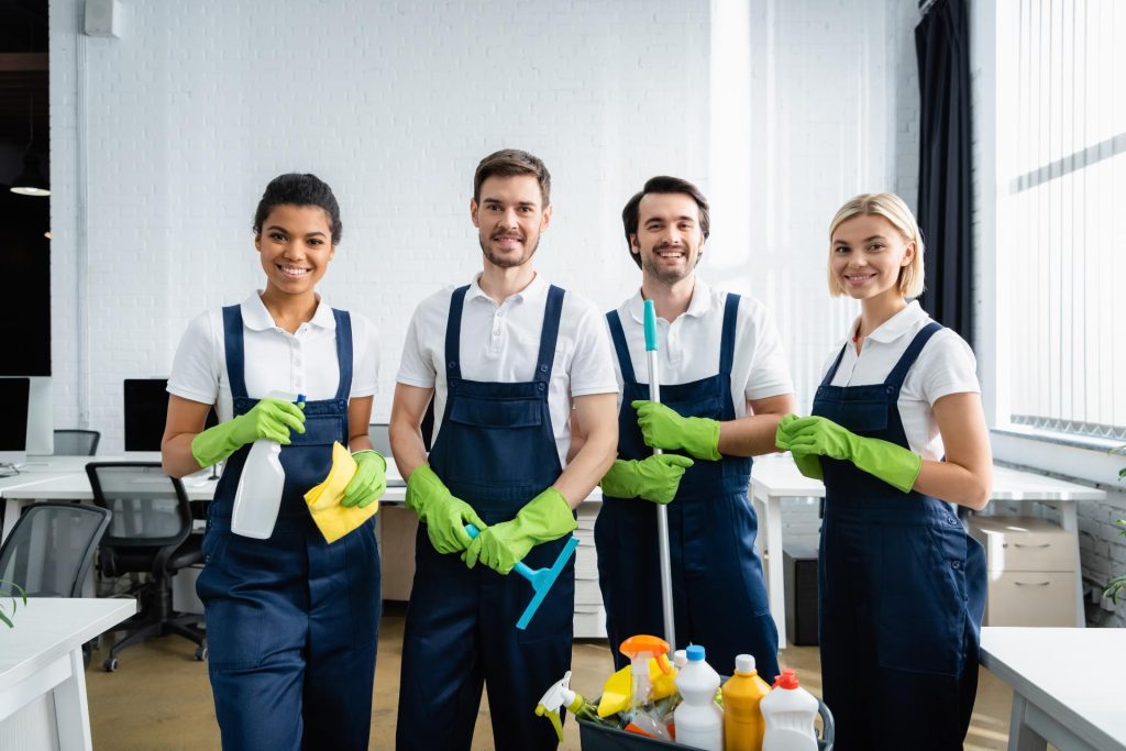 Cleaning crew posing together